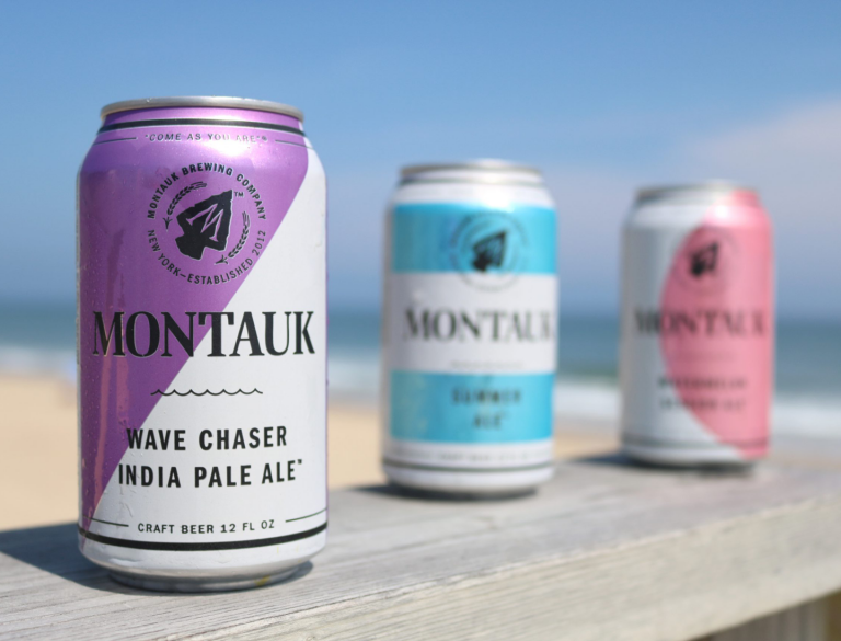Montauk Brewing Co beer cans on the beach